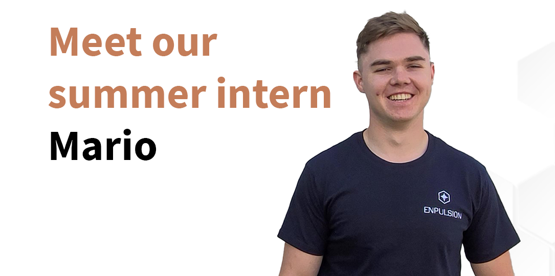 A photo of a person smiling. The person has short brown hair, and is wearing a dark-blue shirt with a white embroidery that says ENPULSION. Left of the person a text reads "Meet our summer intern Mario".