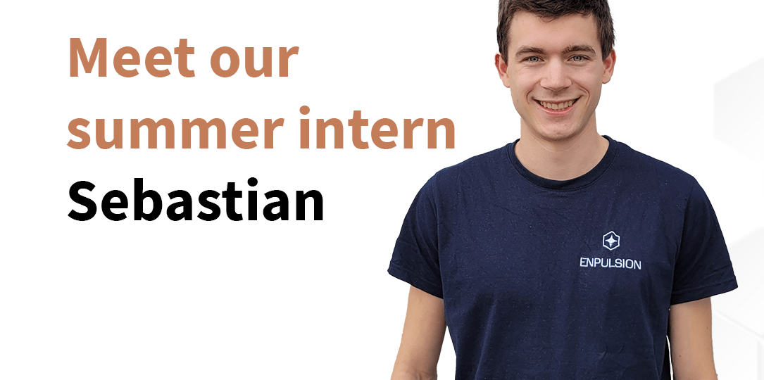 A photo of a person smiling. The person has short brown hair, blue eyes and is wearing a dark-blue shirt with a white embroidery that says ENPULSION. Left of the person a text reads "Meet our summer intern Sebastian".